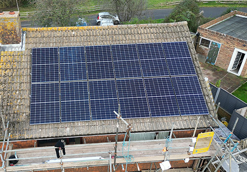 Solar panels in place on roof in Bexhill with scaffolding